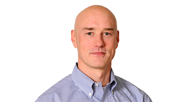 Headshot of William McManus